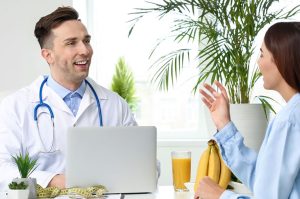 Male Doctor Consulting With A Patient On Weight Loss Medication Prescription Ozempic