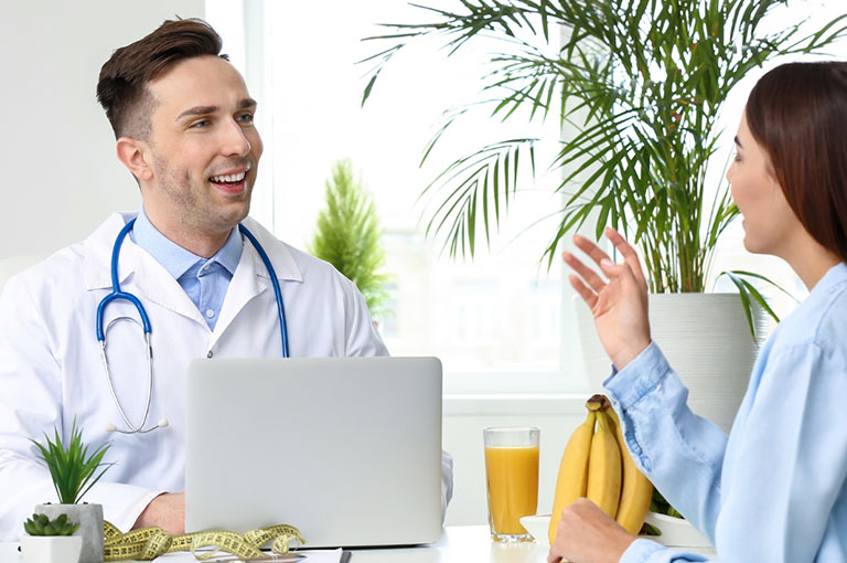 Male Doctor Consulting With A Patient On Weight Loss Medication Prescription Ozepic®